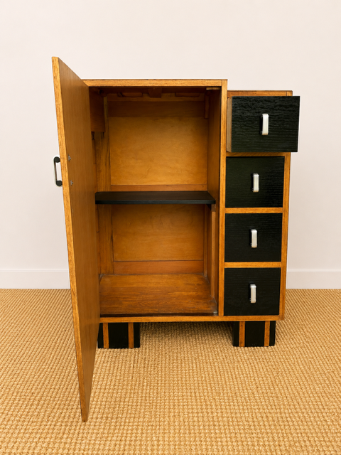 Art Deco storage cabinet open to show shelving and four drawers 