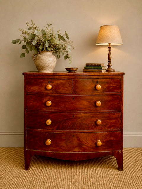 Antique Mahogany Chest Of Drawers styled in a country interior  